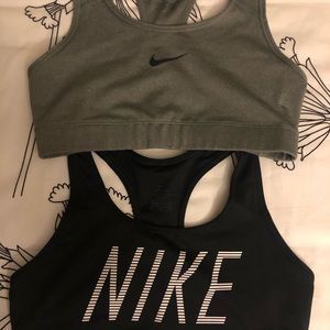 Two Nike DRI-FIT sports bras